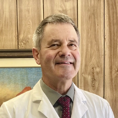 A headshot of Dr. Troy Crane, a chiropractor at Crane Chiropractic & Wellness